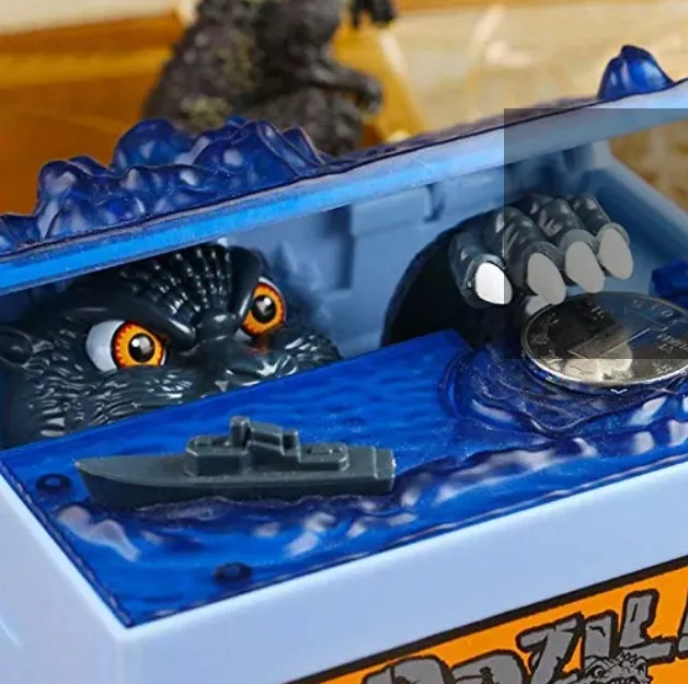 Alcancia electronica de dinosaurio tipo Godzilla